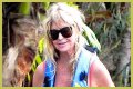 Goldie Hawn Rocks a Red Swimsuit at Age 67, Feeds Dolphins With Kurt Russell